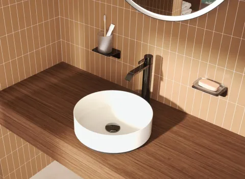 Armatur IMO von Dornbracht in dark Chrom an rundem Waschtisch 