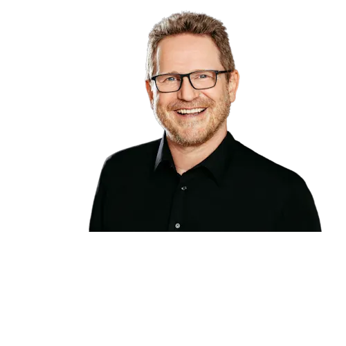 Geschäftsführer Peter Schwendenmann vor neutralem Hintergrund.